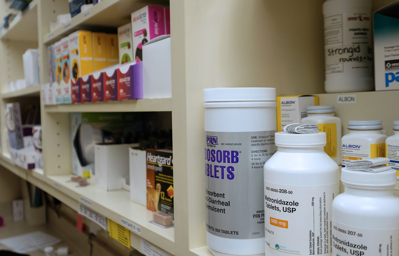 In-house veterinary pharmacy stocked with pet medications and prescriptions at Wales Animal Clinic
